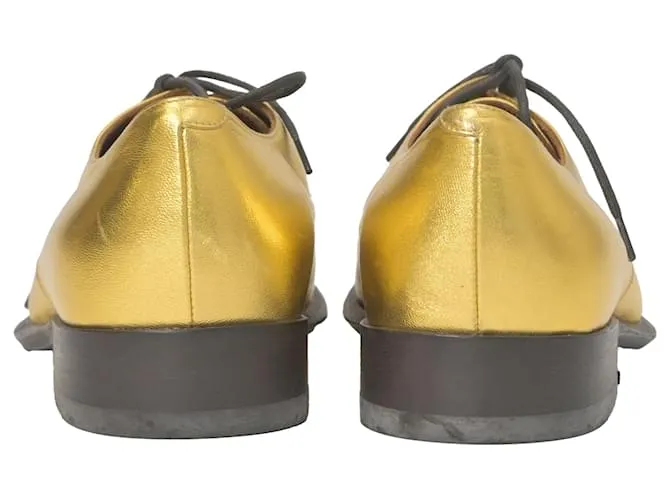 Dries Van Noten Zapatos Oxford con cordones Celine en cuero metálico dorado 