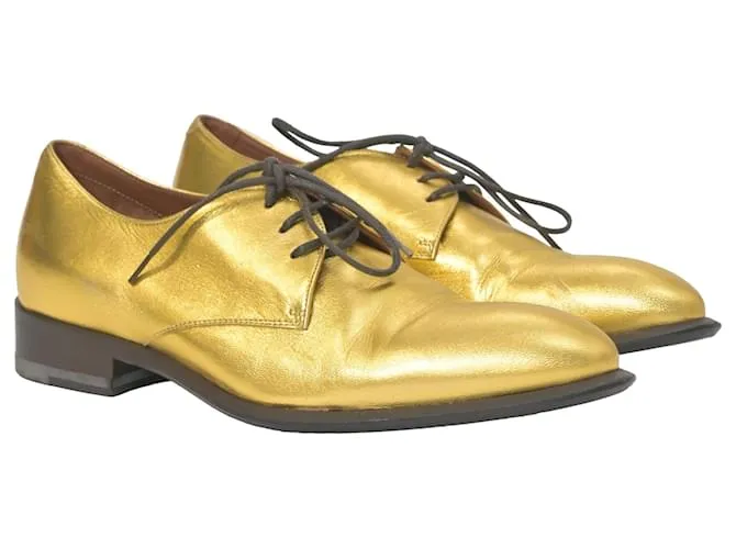 Dries Van Noten Zapatos Oxford con cordones Celine en cuero metálico dorado 