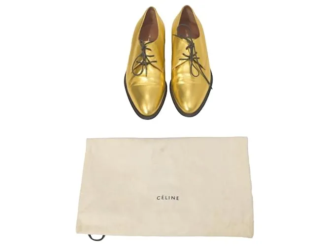 Dries Van Noten Zapatos Oxford con cordones Celine en cuero metálico dorado 