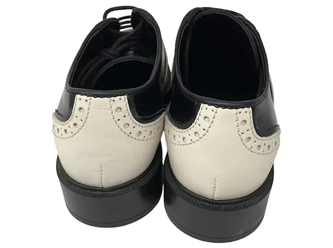 Zapatos Oxford de cuero negro / blanco de Tod's 